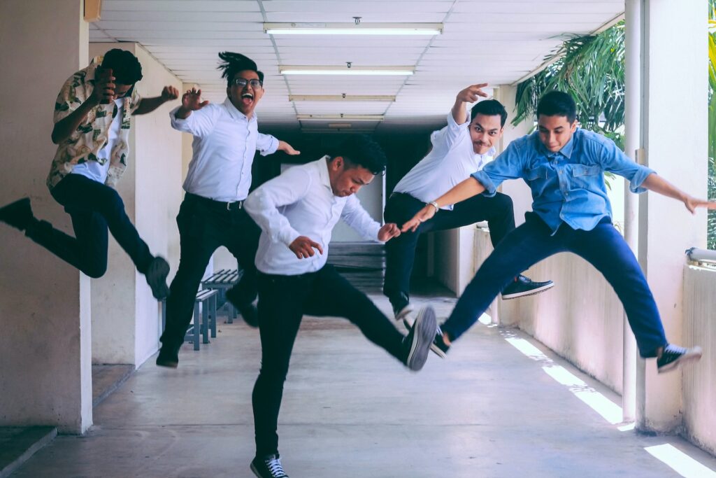 staff jumping in air