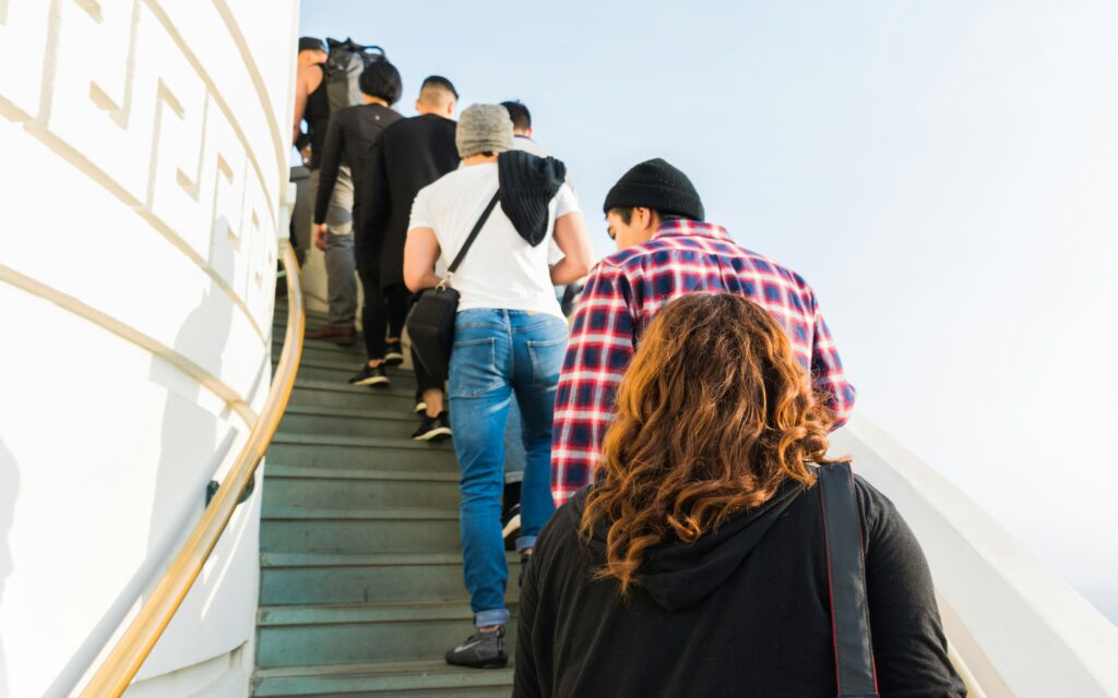Group of people going up a staircase