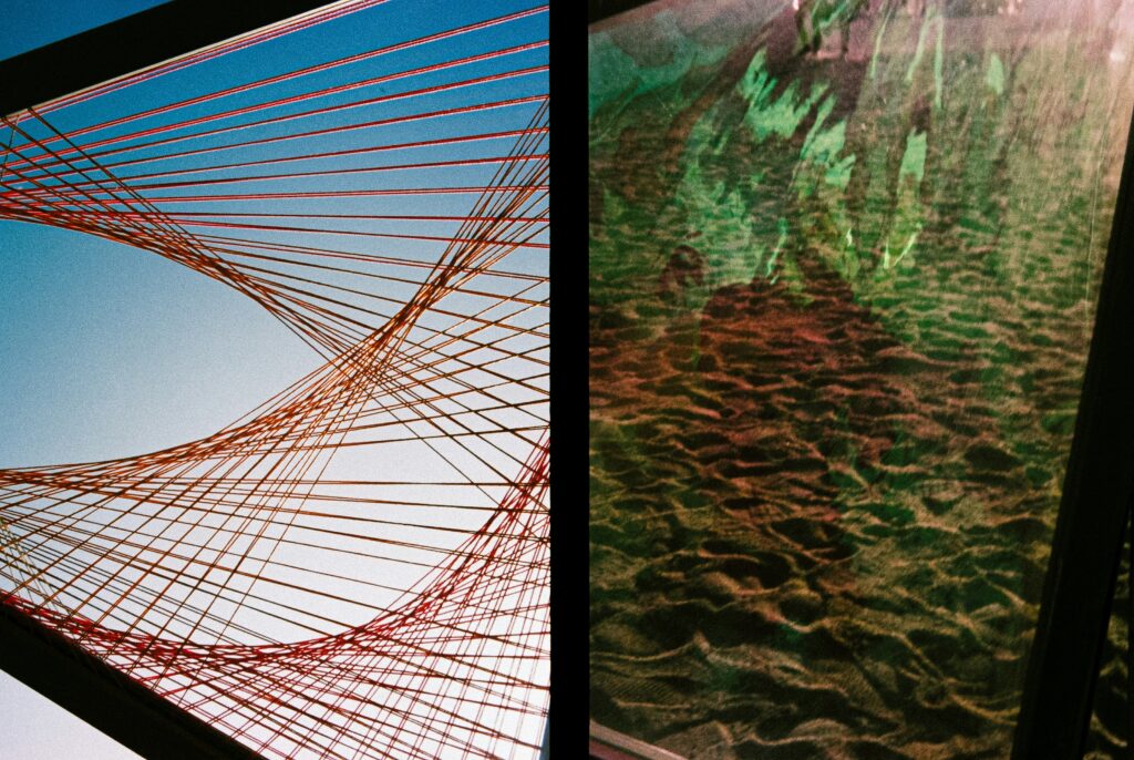 A close up of a picture of a bridge, in two halves